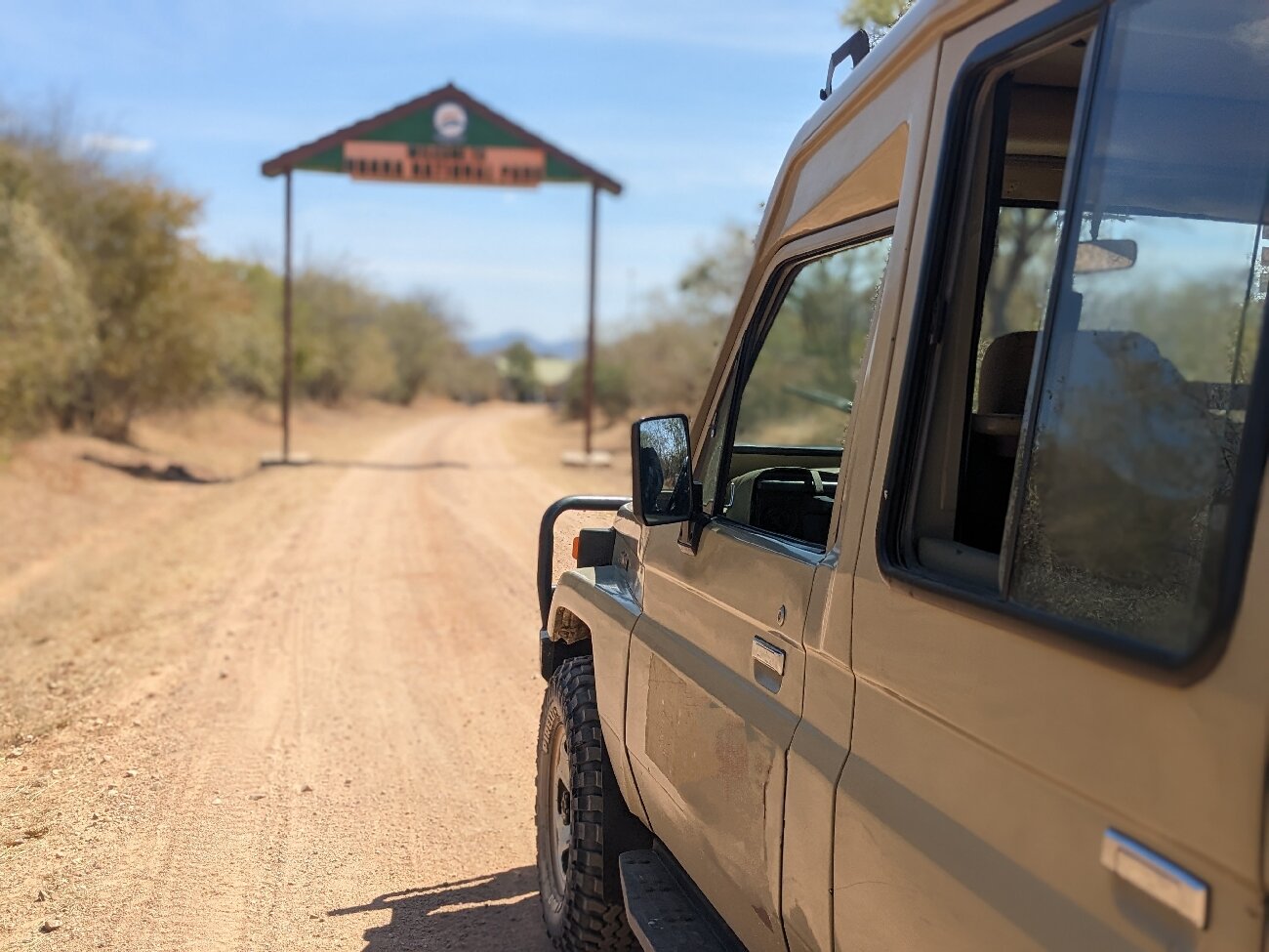 Safari vehicle at the entrance gate of Ruaha National Park